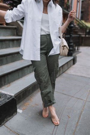 Discover trendy ways to style cargo pants for any occasion! From cozy winter casual to summer poolside chic, explore versatile outfits perfect for brunch, exploring, and casual outings. Find inspiration with these detailed outfit descriptions and styling tips. Cargo Pants Outfit ideas, With A Streetwear Vibe, Cargo Pants Style, A Classic Design, Cargo Pants Fashion, Brown Color, Daily Wear, Modern Style cut, Solid Color, Girl, Tactical Pockets, Black, Khaki Color Discover trendy ways to style cargo pants for any occasion! From cozy winter casual to summer poolside chic, explore versatile outfits perfect for brunch, exploring, and casual outings. Find inspiration with these detailed outfit descriptions and styling tips. Cargo Pants Outfit ideas, With A Streetwear Vibe, Cargo Pants Style, A Classic Design, Cargo Pants Fashion, Brown Color, Daily Wear, Modern Style cut, Solid Color, Girl, Tactical Pockets, Black, Khaki Color